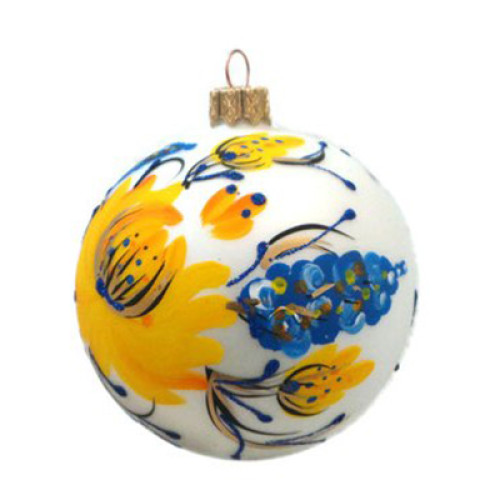 A white handmade glass Christmas tree ball with a depiction of yellow flowers, 3,25 inches