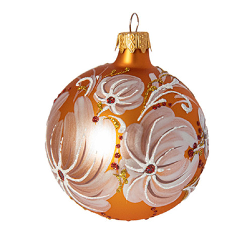 A golden handmade glass Christmas tree ball painted with white flowers and embellished with glitter and rhinestones, 3,25 inches