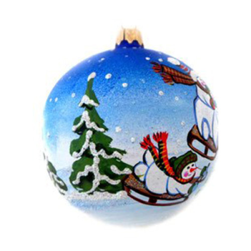 A blue handmade glass Christmas tree ball with an artistic painting, embellished with glitter "Snowmen with sledges", 3,25 inches