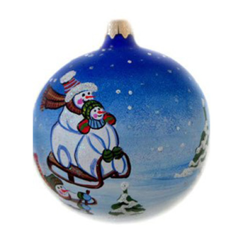 A blue handmade glass Christmas tree ball with an artistic painting, embellished with glitter "Snowmen with sledges", 3,25 inches