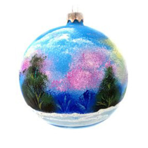 A blue handmade glass Christmas tree ball with an artistic painting, embellished with glitter "A winter village", 4 inches