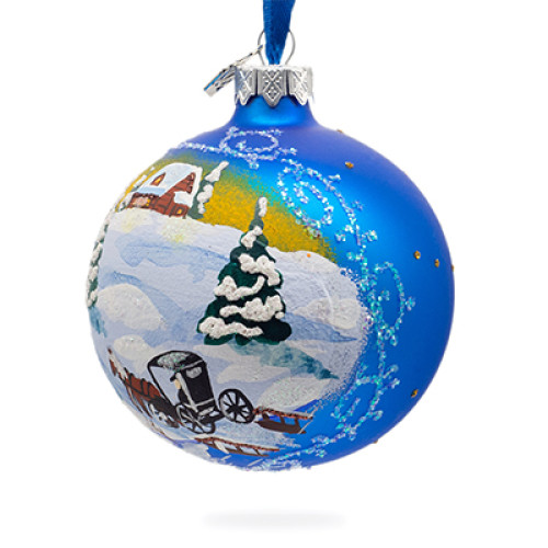 A blue handmade glass Christmas tree ball with an artistic painting, embellished with glitter "A winter landscape", 4 inches