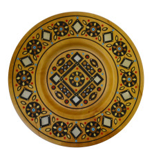 A wooden decorative plate with a traditional Ukrainian tracery, encrusted with beads,
