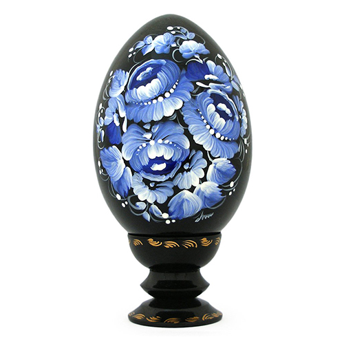 A wooden handmade pysanka, painted in Petrykivskyi painting style, 13 cm