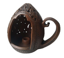 A ceramic handmade candleholder, pysanka shaped, 15.5 cm