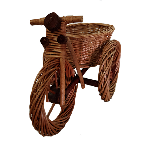 A brown plant stand made of wicker, tricycle shaped, 52x30x39cm