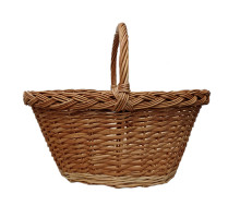 A high oval brown basket made of wicker, with a round handle, L=52 cm, h=45 cm + handle