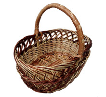An oval light-brown basket made of wicker, on a stand, L=39 cm, h=37 cm + handle