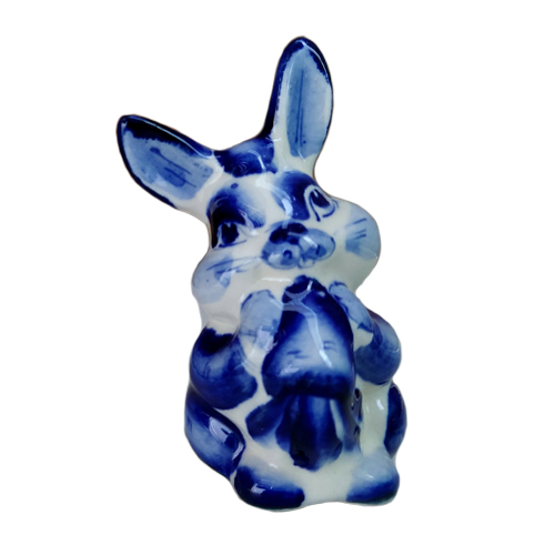 A ceramic handmade figure "A hare with a carrot" with a blue painting, h=7.3 cm