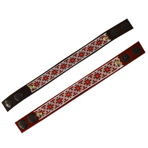 A leather bracelet with traditional Ukrainian red and black ornament