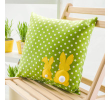 A light-green decorative pillow with polka dots and embroidered hare, 43x43 cm