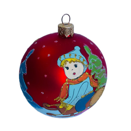 A red handmade glass Christmas tree ball with a silver depiction of a snowflake, embellished with beads and glitter,