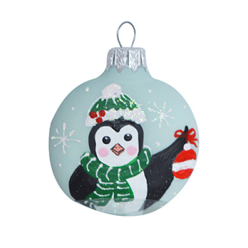 A transparent handmade glass Christmas tree pendant "Penguins at the celebration",