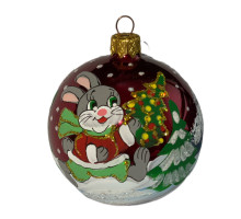 A red handmade glass Christmas tree ball with a depiction of a fairytale bunny in the forest, 3,25 inches