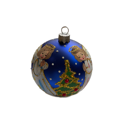 A red handmade glass Christmas tree ball with a silver depiction of Christmas angels near a Christmas tree, 3,25 inches