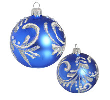 A blue handmade glass Christmas tree ball with a silver floral ornament, 3,25 inches