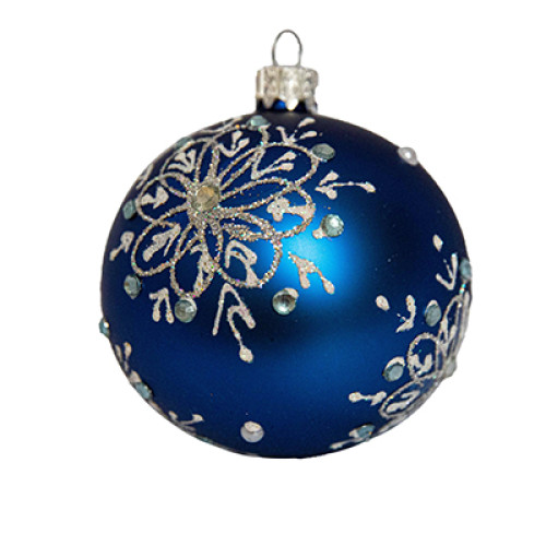 A blue handmade glass Christmas tree ball with a silver depiction of a snowflake flower, embellished with beads and glitter, 3,25 inches