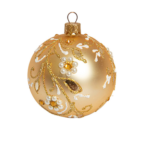 A champagne handmade glass Christmas tree ball with a golden floral ornament, 3,25 inches