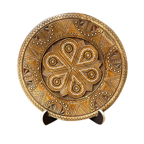 A carved wooden decorative plate with traditional Hutsul ornaments, 7-8,6 inches