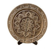 A carved wooden decorative plate with a traditional Hutsul ornament, 8,6-10 inches
