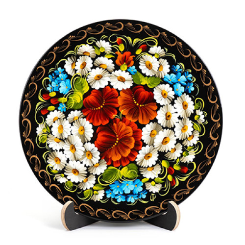A wooden decorative plate with poppy flowers and camomiles made in Petrykivskyi painting technique, 9 inches