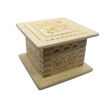 A carved handmade wooden casket with a traditional Ukrainian tracery, 4x4 inches