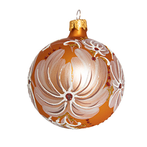 A golden handmade glass Christmas tree ball painted with white flowers and embellished with glitter and rhinestones, 3,25 inches