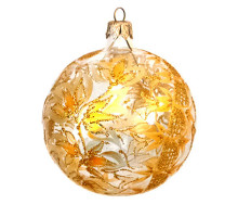 A transparent handmade glass Christmas tree ball with a bright golden ornament and embellished with golden glitter, 3,25 inches
