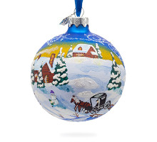 A blue handmade glass Christmas tree ball with an artistic painting, embellished with glitter "A winter landscape", 3.25 inches