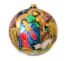A blue handmade glass Christmas tree ball with an artistic painting, embellished with glitter "Newly born Christ", 4 inches