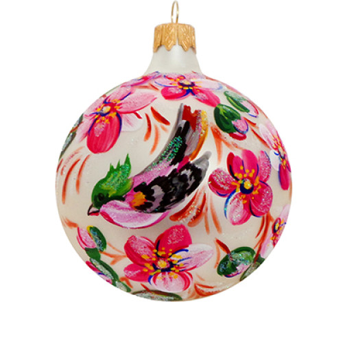 A white handmade glass Christmas tree ball with a pink flower painting, 3,25 inches