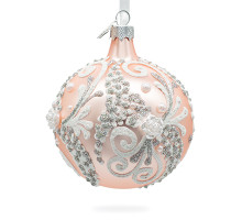 A pale pink handmade glass Christmas tree ball with a floral ornament, embellished with 3D flowers and glitter, 3,25 inches