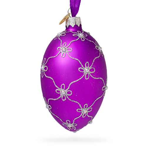 A purple handmade glass Christmas tree egg shaped pendant made in Faberge egg style with an artistic painting, embellished with glitter and beads, 2.6 inches