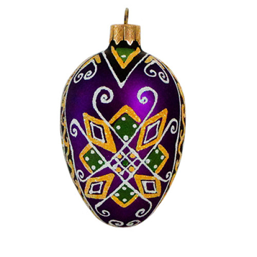 A green and purple handmade glass Christmas tree egg shaped pendant with a geometrical ornament, embellished with glitter, 2.6 inches
