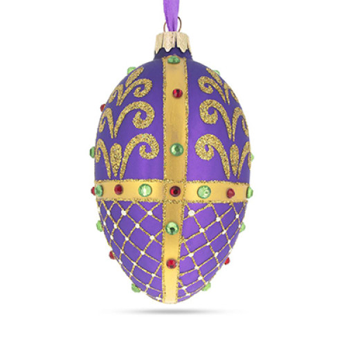 A purple handmade glass Christmas tree egg shaped pendant with a royal ornament, embellished with glitter and beads, 2.6 inches