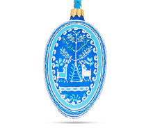 A sky-blue handmade glass Christmas tree egg shaped pendant with a Ukrainian traditional ornament, embellished with glitter "Two deer", 2.6 inches