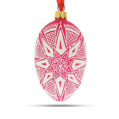 A pink handmade glass Christmas tree egg shaped pendant with a Ukrainian traditional ornament "A white star", 2.6 inches