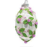 A white handmade glass Christmas tree egg shaped pendant with a gentle spiral tracery, embellished with glitter, pearls and 3D roses, 2.6 inches