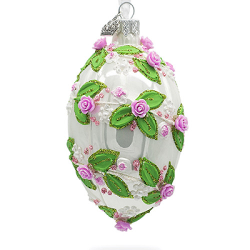 A white handmade glass Christmas tree egg shaped pendant with a gentle spiral tracery, embellished with glitter, pearls and 3D roses, 2.6 inches