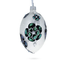 A silver handmade glass Christmas tree egg shaped pendant with voluminous velour flowers, embellished with pearls and glitter, 2,6 inches