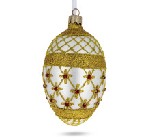 A white handmade glass Christmas tree egg shaped pendant with a traditional ornament, embellished with glitter and beads "Golden stars", 2.6 inches