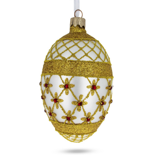 A white handmade glass Christmas tree egg shaped pendant with a traditional ornament, embellished with glitter and beads "Golden stars", 2.6 inches