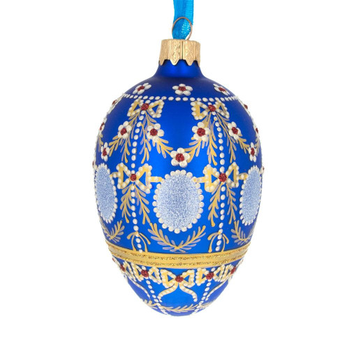 A blue handmade glass Christmas tree egg shaped pendant made in Faberge egg style with an artistic painting "Oleksandrivskyi palace",  2.6 inches