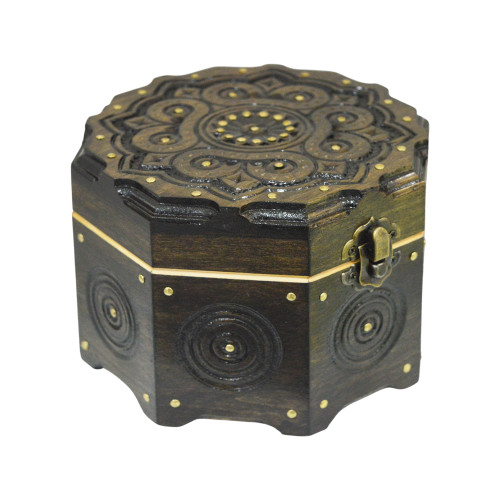 A handmade octahedral wooden casket, decorated with metal elements,