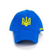 A blue baseball cap with the coat of arms of Ukraine